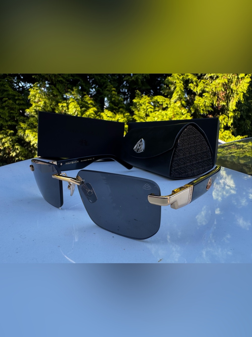Men’s Rimless Gray Sunglasses with Gold Accents